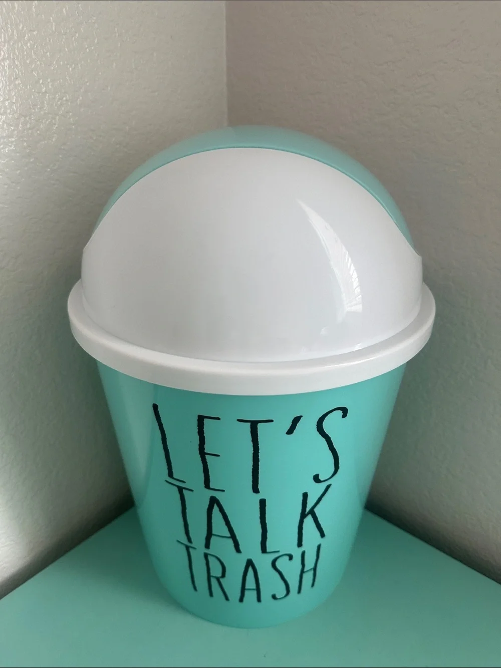 Essential Home Designs-basic plastic trash can with swinging top-new